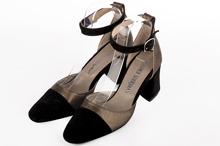 Matt black and bronze gold women's open side shoes, with a strap around the ankle. Round toe. Medium flare heels. Front view - Florence KOOIJMAN